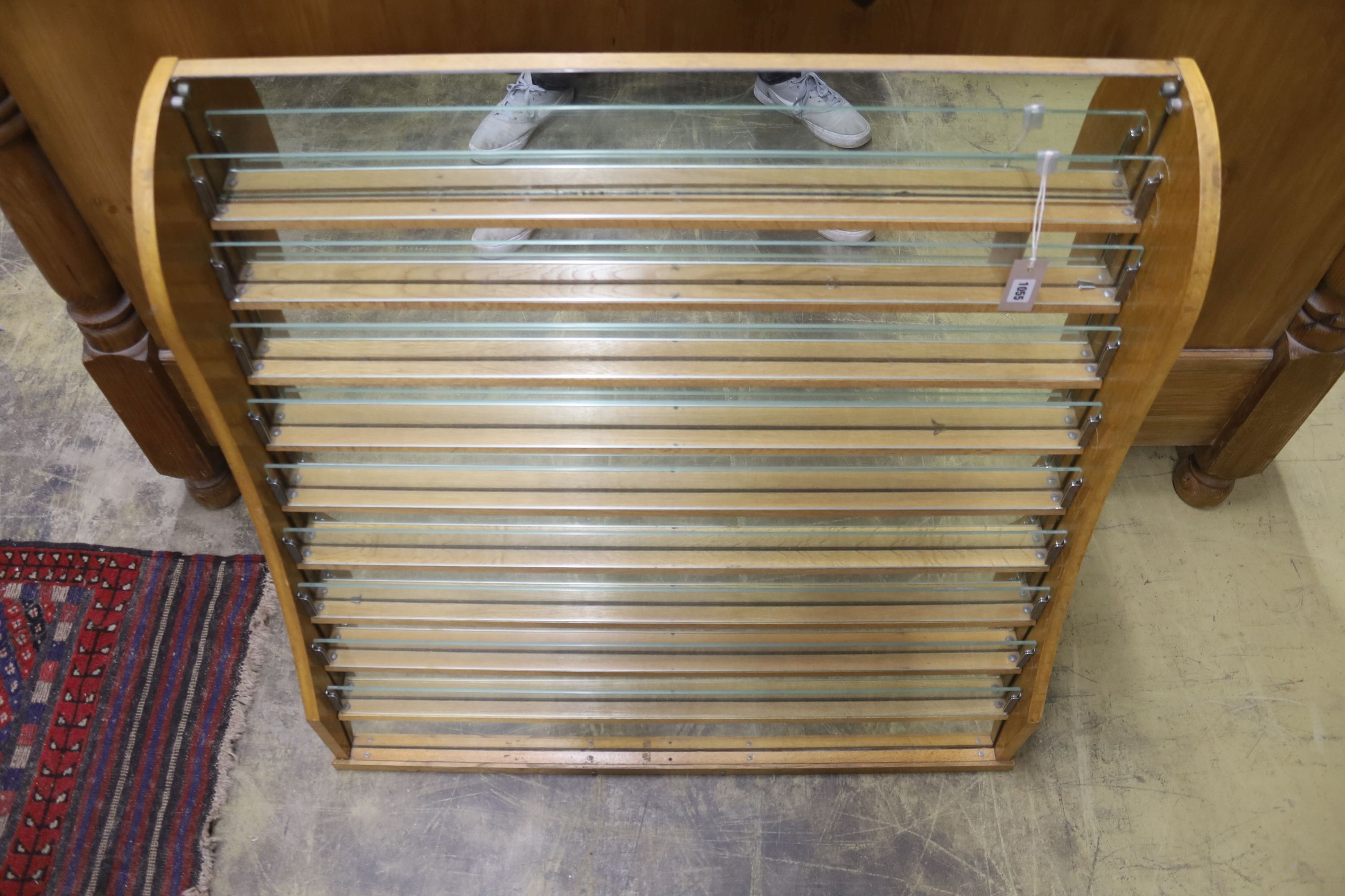 A mid century mirrored oak countertop shop shelving unit, length 94cm, depth 36cm, height 92cm
